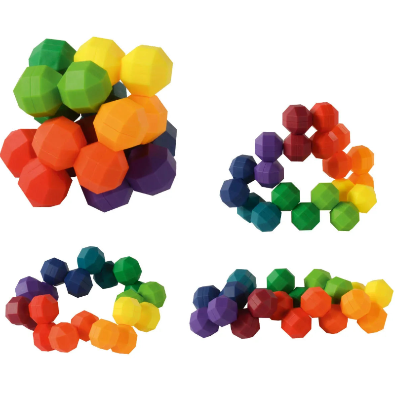 knobbel fidget regenbogen kleuren in vier schillende posities gedraaid., motoriekspeelgoed, vinger motoriek
