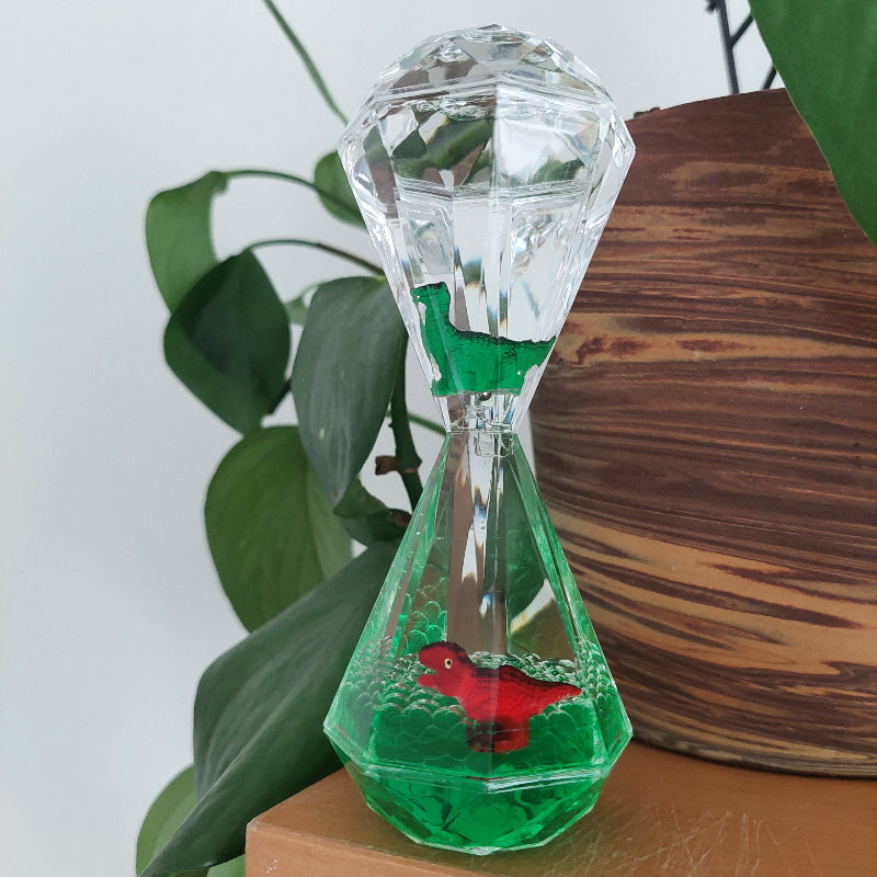 groene olie loper, zandloper met olie, in diamantvorm met groene olie en dino voor plantenpot