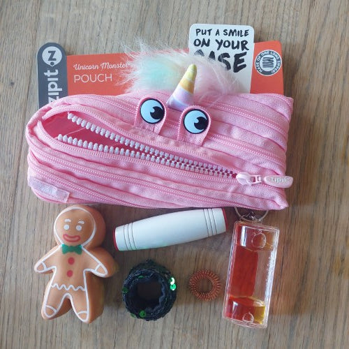 rits etui van zip it, gevuld met fidgets