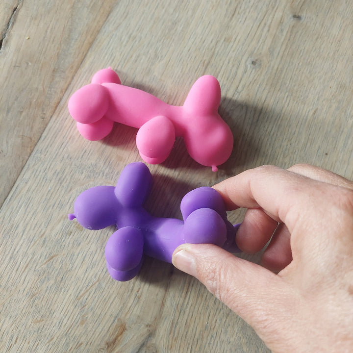 fidget stretch ballon honden 2 stuks, roze en paars met hand