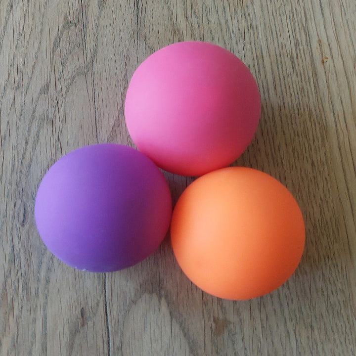 squishy anti stressballen drie stuks, paars, roze en oranje, fidget ballen