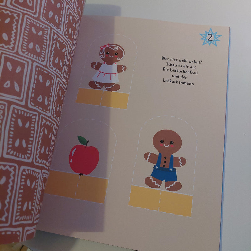 knutselpagina van het pepperkoek huis adventskalender knutselboek, motoriek speelgoed, fijne motoriek oefening