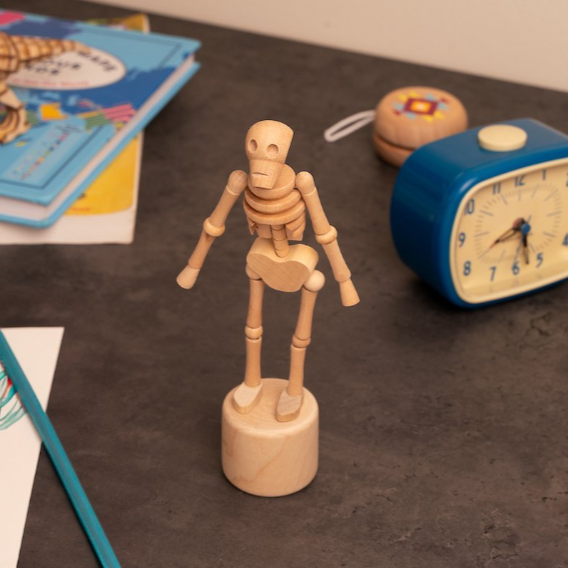retro drukpop lazy bones skelet van kikkerland op kindkamer tafel met wekker
