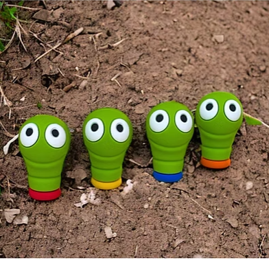 fijne motoriek wormpjes in aarde, vier stuks, met vrolijke ogen