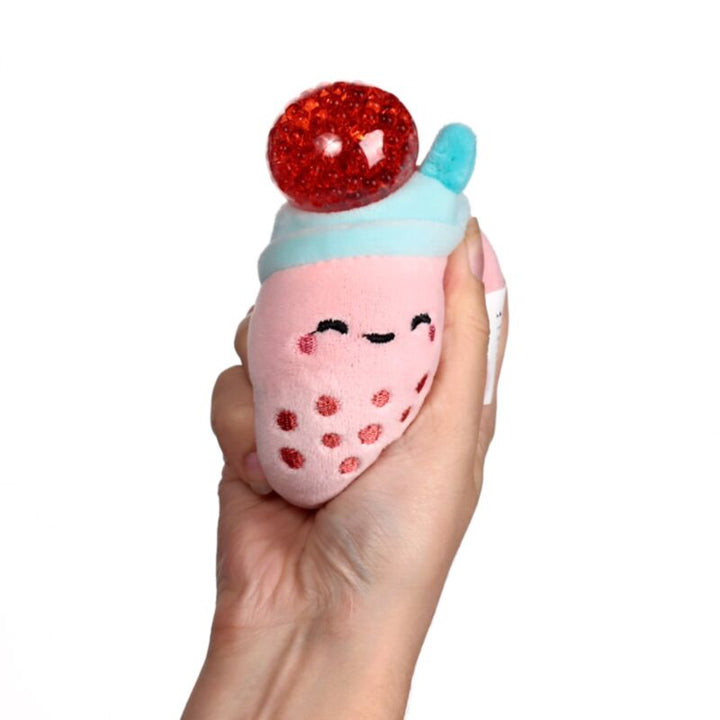 Queasy Squeezies bubble tea knijpknuffel van zachte pluche roze met rode flutschi, fidget