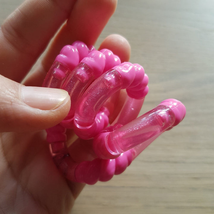 roze tangle crush, fidget toys, friemelspeelgoed