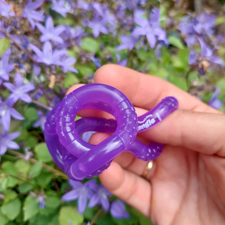 tangle grow in the dark paars, purple tangle, fidget toys