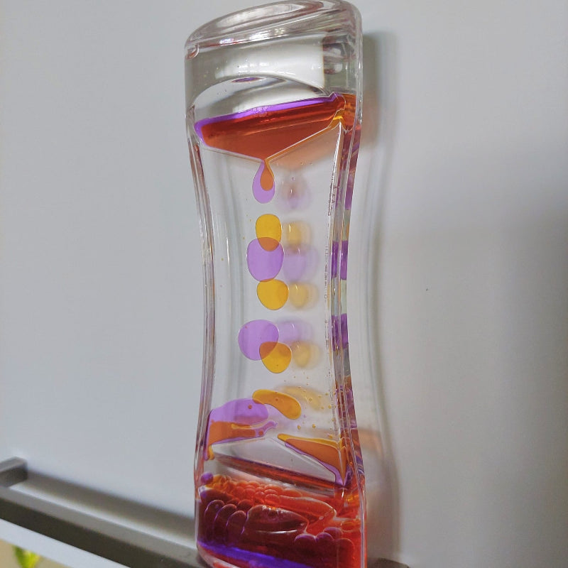 liquid zandloper, lavaloper, liquid motion