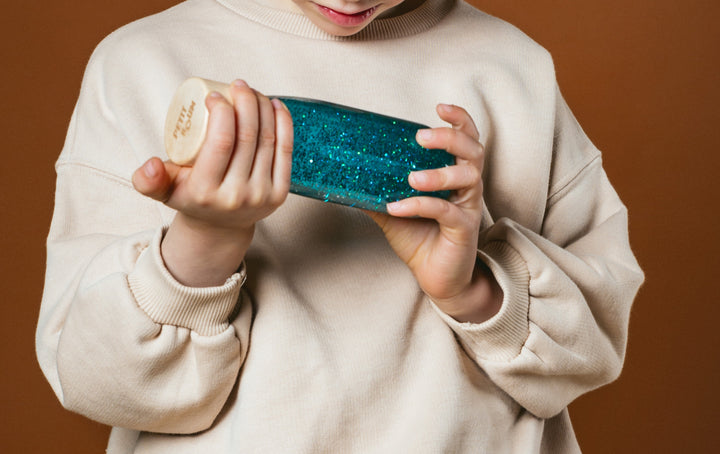 Petit Boum Sensorische float fles turquoise