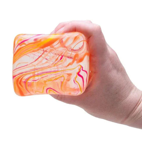 niceberg swirl oange in hand, sensorik antistressball van needoh, nee doh