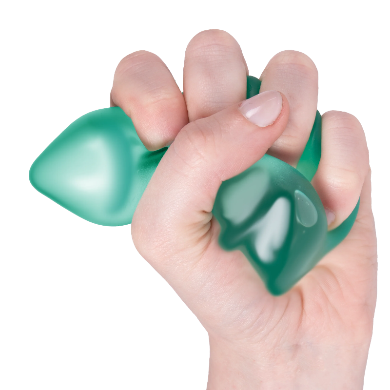 hand knijpt anitstressbal tree van speks, christmas tree van speks