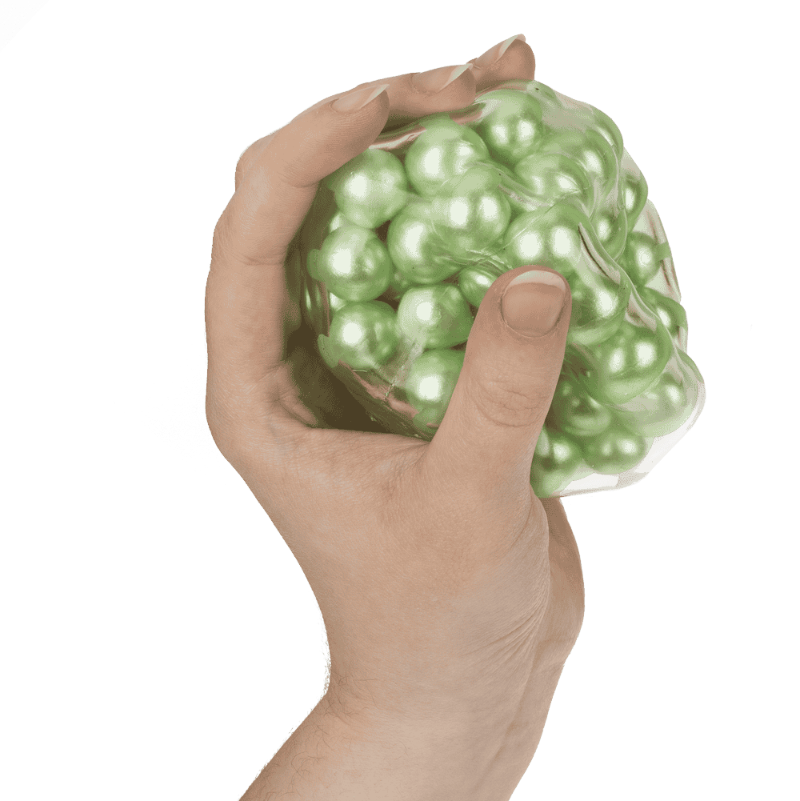 hand met groene xl asmr sensoriek squeeze ball, antistressball, sensoriekmateriaal, sie materiaal